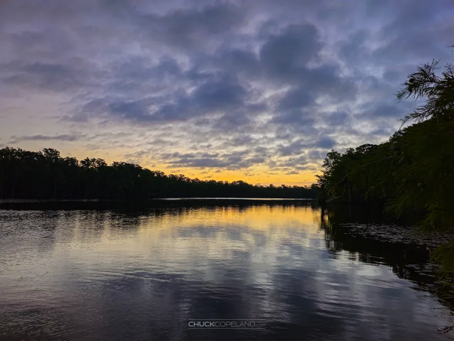 Sunset reflected across the calm Cashie River